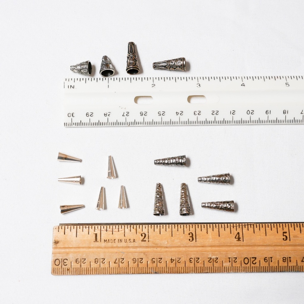 9 silver plated pewter cones + 16 sterling silver cones